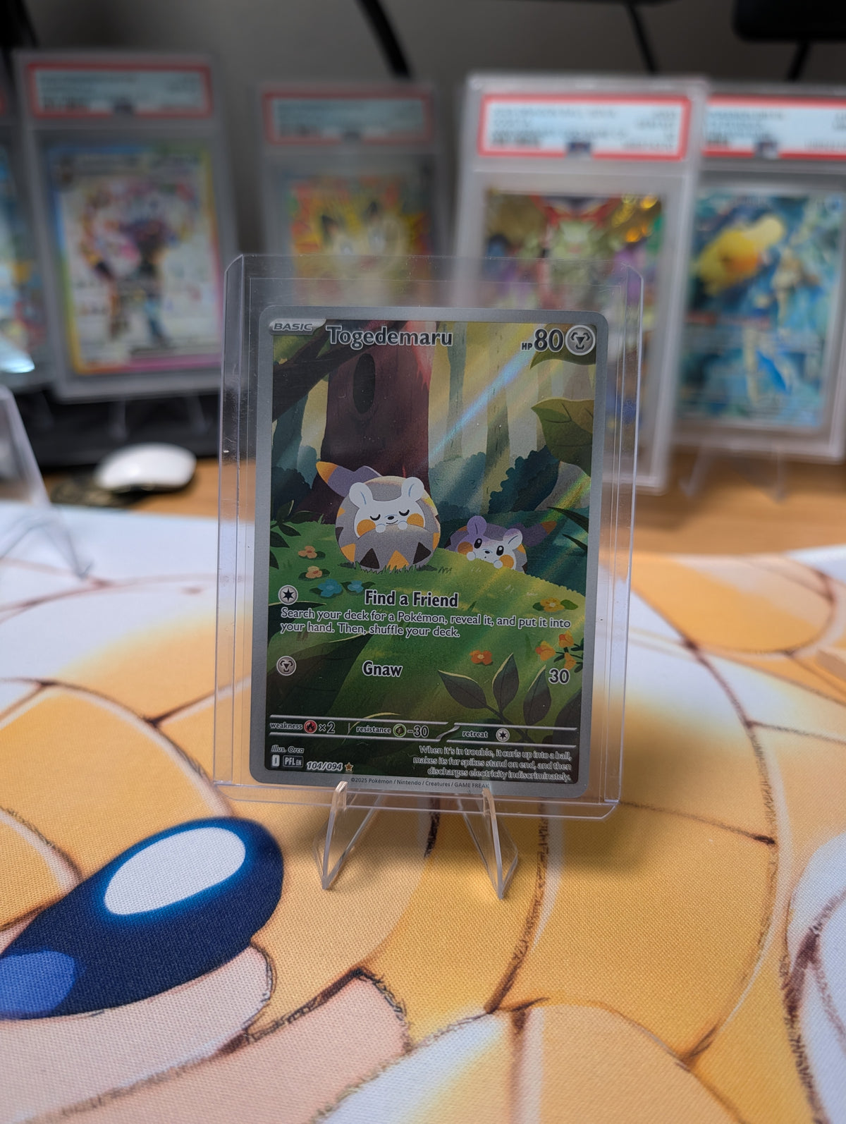 Togedemaru 104/094 — Phantasmal Flames (English)