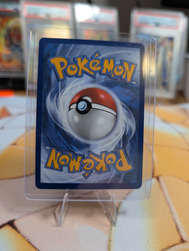 Back of the exact Goldeen 087/084 English card — Near Mint