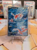 Front of the exact Goldeen 087/084 English card — Near Mint