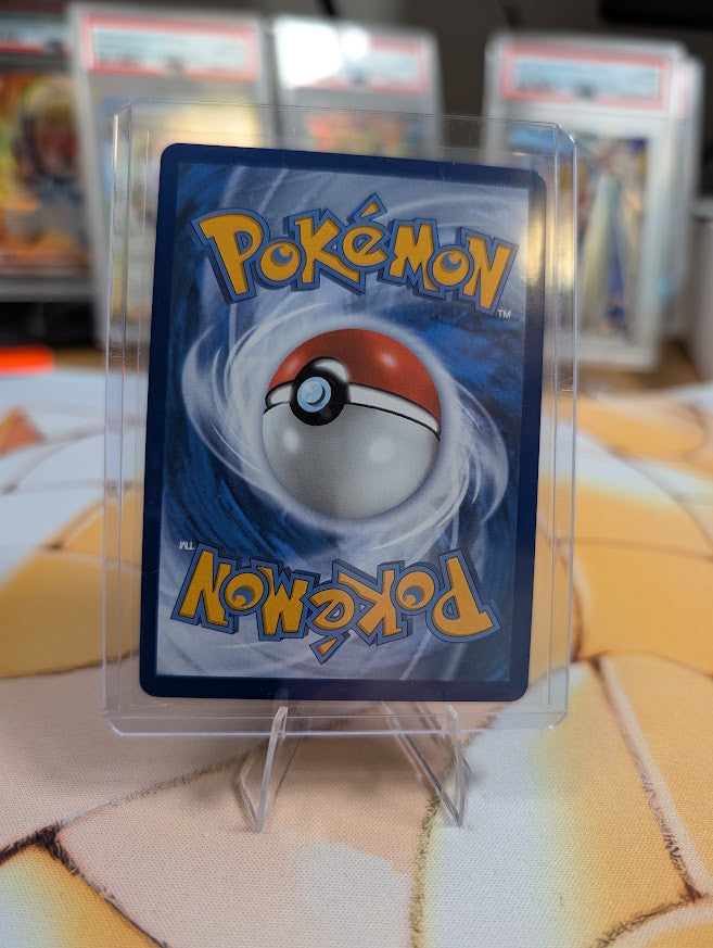Back of the exact Mega Zeraora ex 098/084 English card — Near Mint